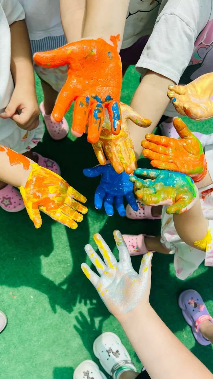 Children with painted hands